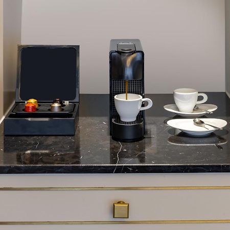 Melia Vinpearl Hue Hotel Екстериор снимка A Nespresso coffee machine in a hotel room