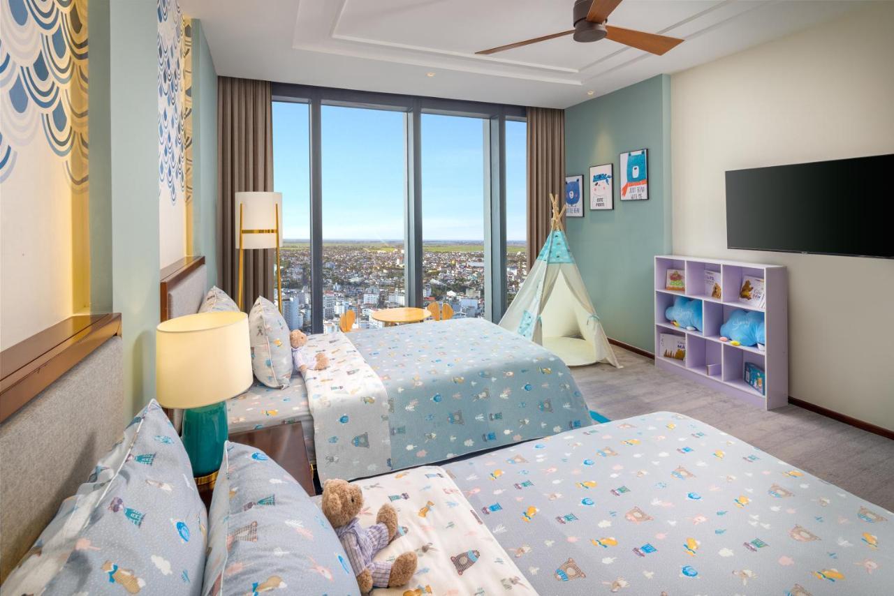 Melia Vinpearl Hue Hotel Екстериор снимка A bedroom at the Atlantis Paradise Island