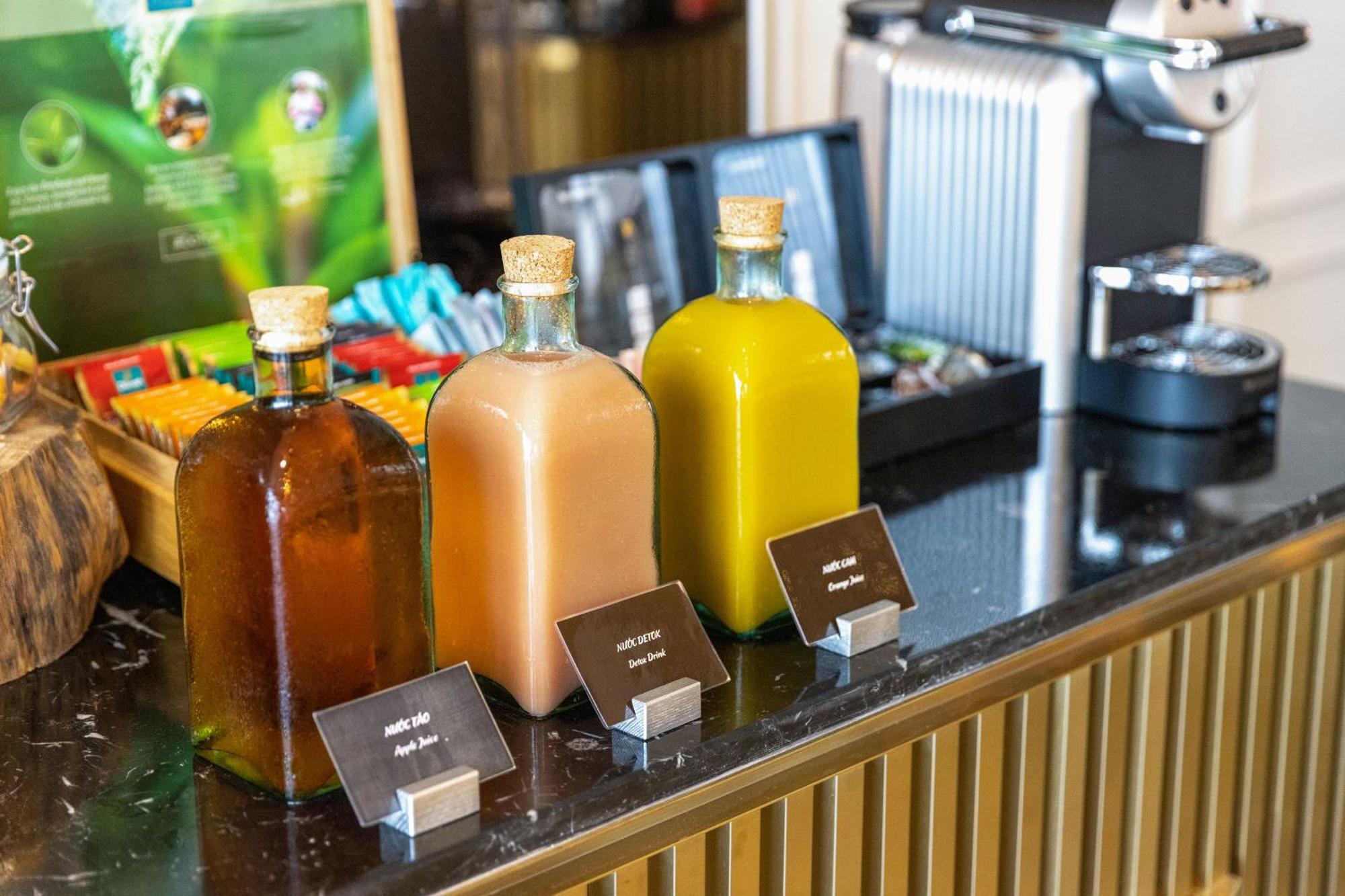 Melia Vinpearl Hue Hotel Екстериор снимка Bottles of fruit juice